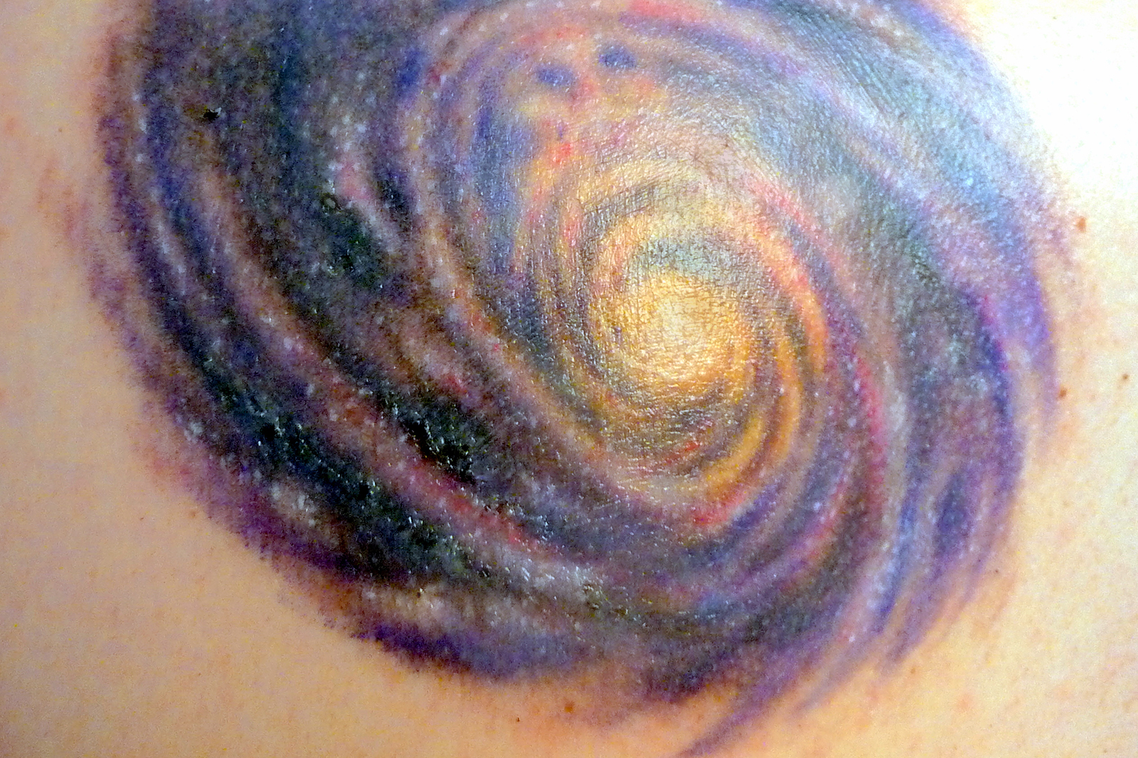 Lexica  Tattoo design of a galaxy made in black and white pointillism