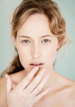 woman touching lips