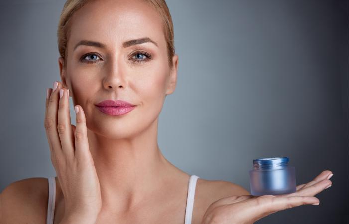 woman with beauty cream