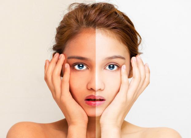 woman half white half dark face