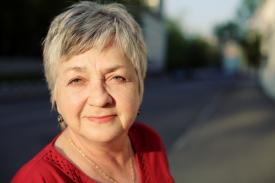 mature woman with crow's feet