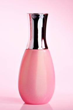 Bottle of opalescent pink nail polish