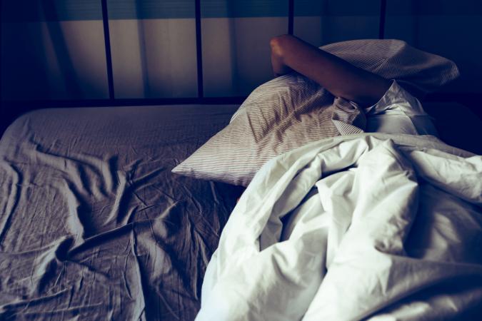 A woman trying to sleep