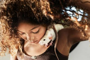 Girl with rat on shoulder