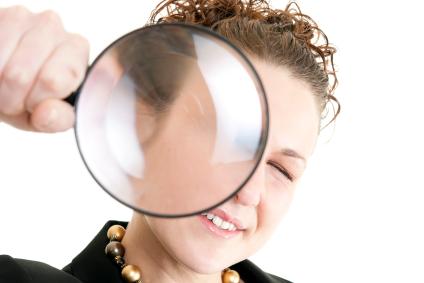 woman with magnifying glass
