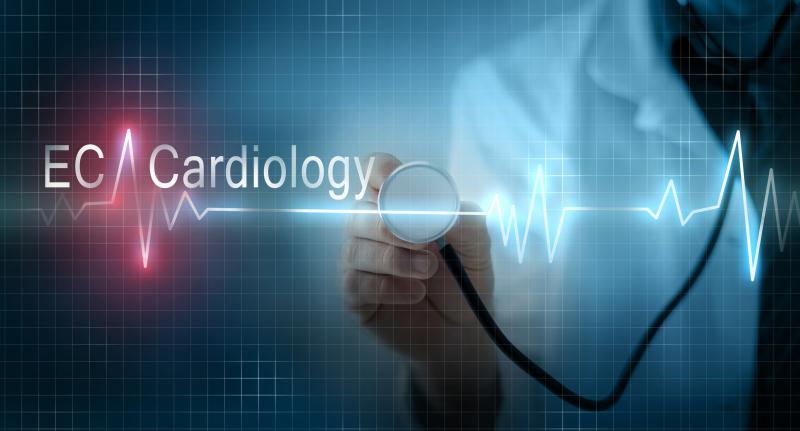 Doctor holding stethoscope on virtual monitor