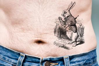 https://cf.ltkcdn.net/tattoos/images/slide/208702-850x566-White-Rabbit-Pocket-Watch-Tattoo-Idea.jpg