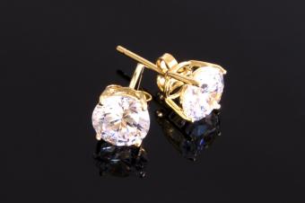 Gold stud earrings