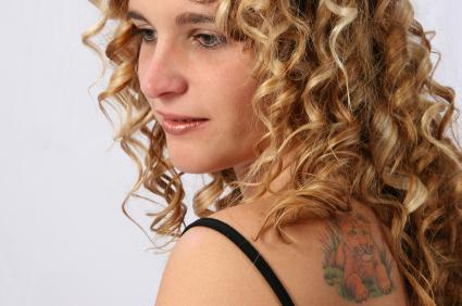 Lion Tattoo on Woman's Shoulder