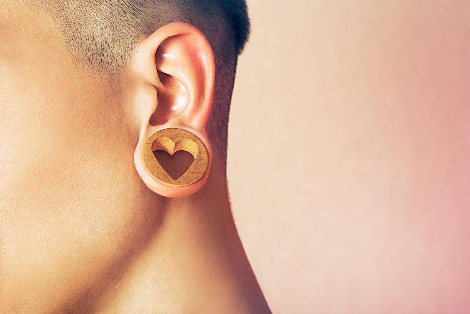 Man with ear tunnel