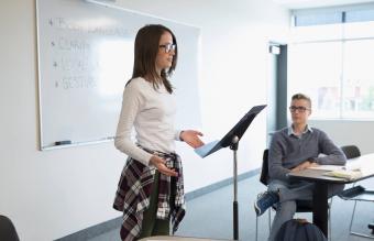 Girl student speaking in classroom