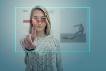 Woman touching online computer screen