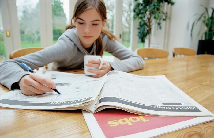 Teenage Girl Searching for Jobs