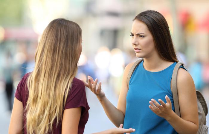 Friends talking seriously