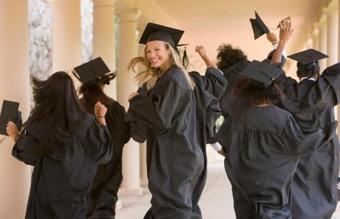 Graduating students in caps and gowns