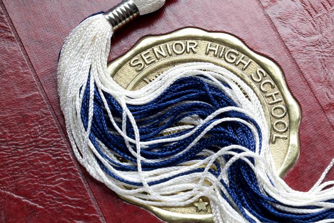 High school yearbook and tassel