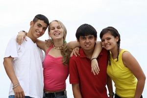Happy teen members of a youth group