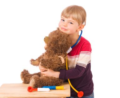 Child pretending to be a doctor