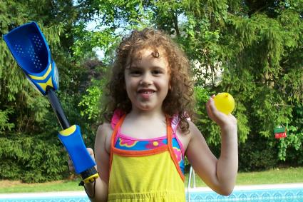 Child holding KAOS Nemesis Wrist Launcher
