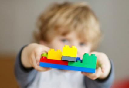 Boy playing with Legos