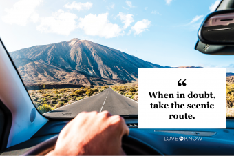 Person driving car in a beautiful mountain road