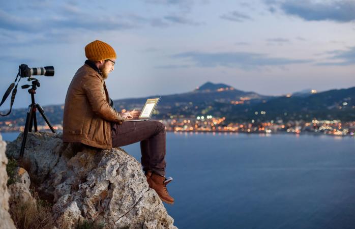 Photographer working on laptop