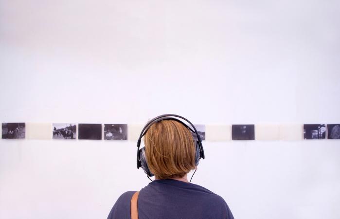 woman looking at exhibition