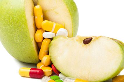 Vitamins and green apple