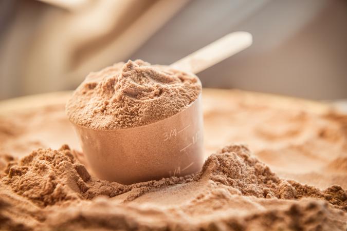Vegan protein powder and scoop