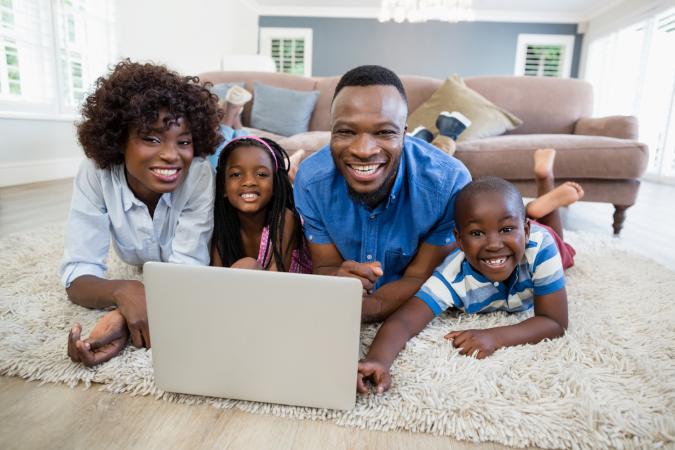 family using laptop