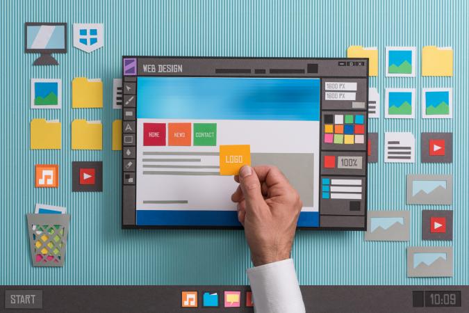 Hand placing component of website design