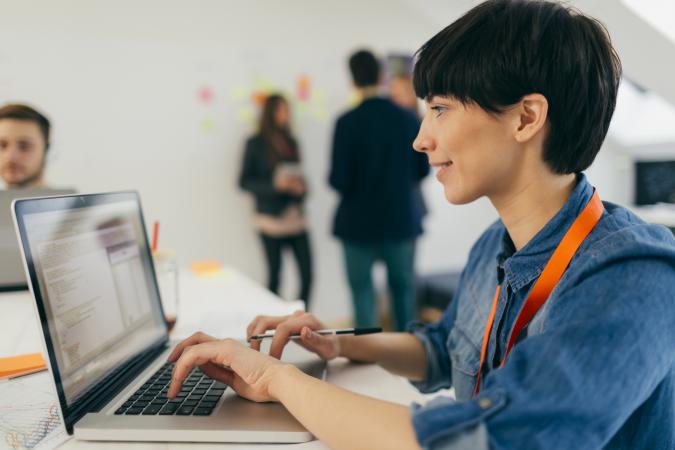 Web designer at work on computer