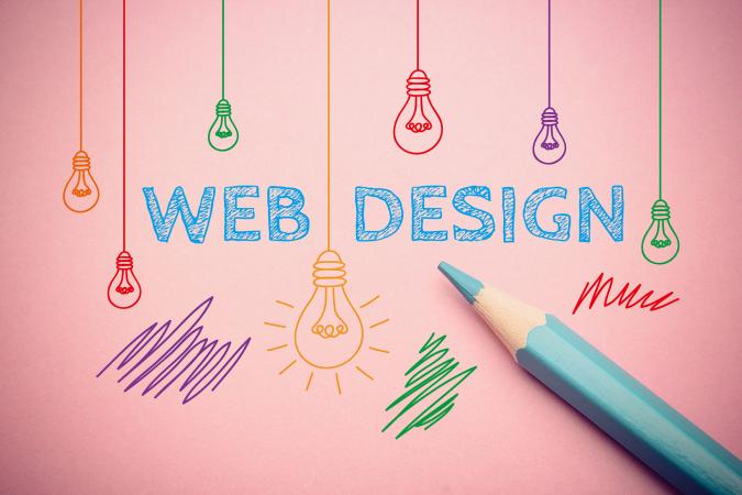 Web design words with blue pencil
