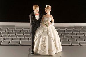 Bridal figurines on a laptop keyboard