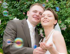 Couple enjoying bubbles at their second wedding