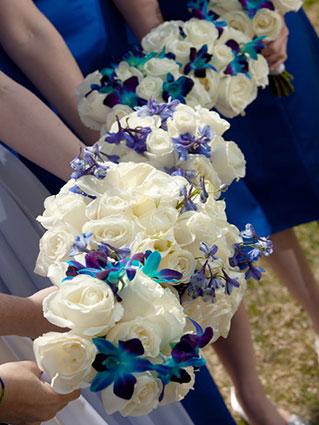 Bridesmaids holding wedding bouquets