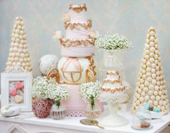 Carriage cake and elegant sweets table