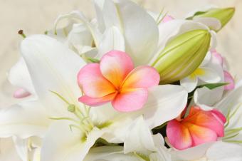 wedding bouquet of lily and pink frangipani