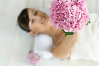 Bride holding pink hydrangea wedding bouquet