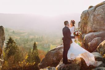 romantic couple having an autumn mountain wedding