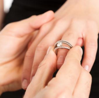 Putting a ring on her finger