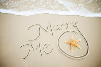 Marry Me Message Handwritten in Sand