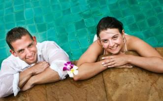 newlyweds in swimming pool