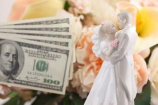 money with flowers and cake topper