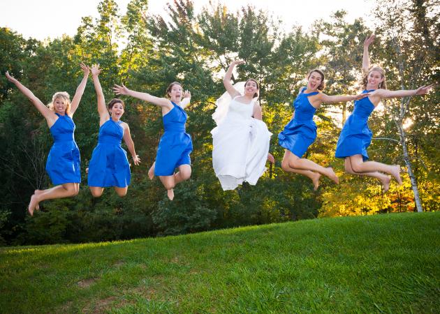 Bridesmaid And Bride Jumping