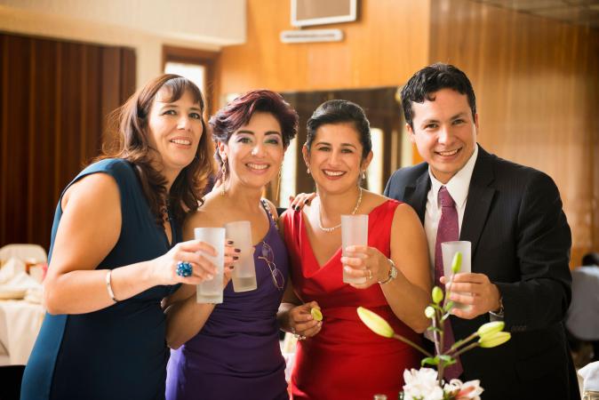 Family toasting at wedding reception