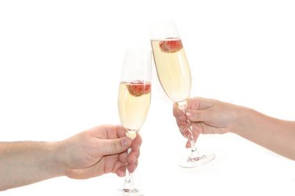 Toasting the wedding with glasses of Champagne
