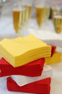 Wedding napkins in claret red, yellow and white