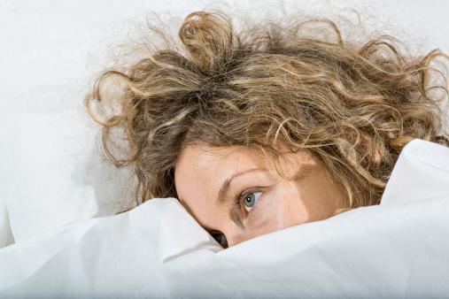 woman awake in bed
