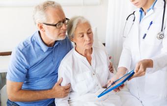 elderly patient with doctor